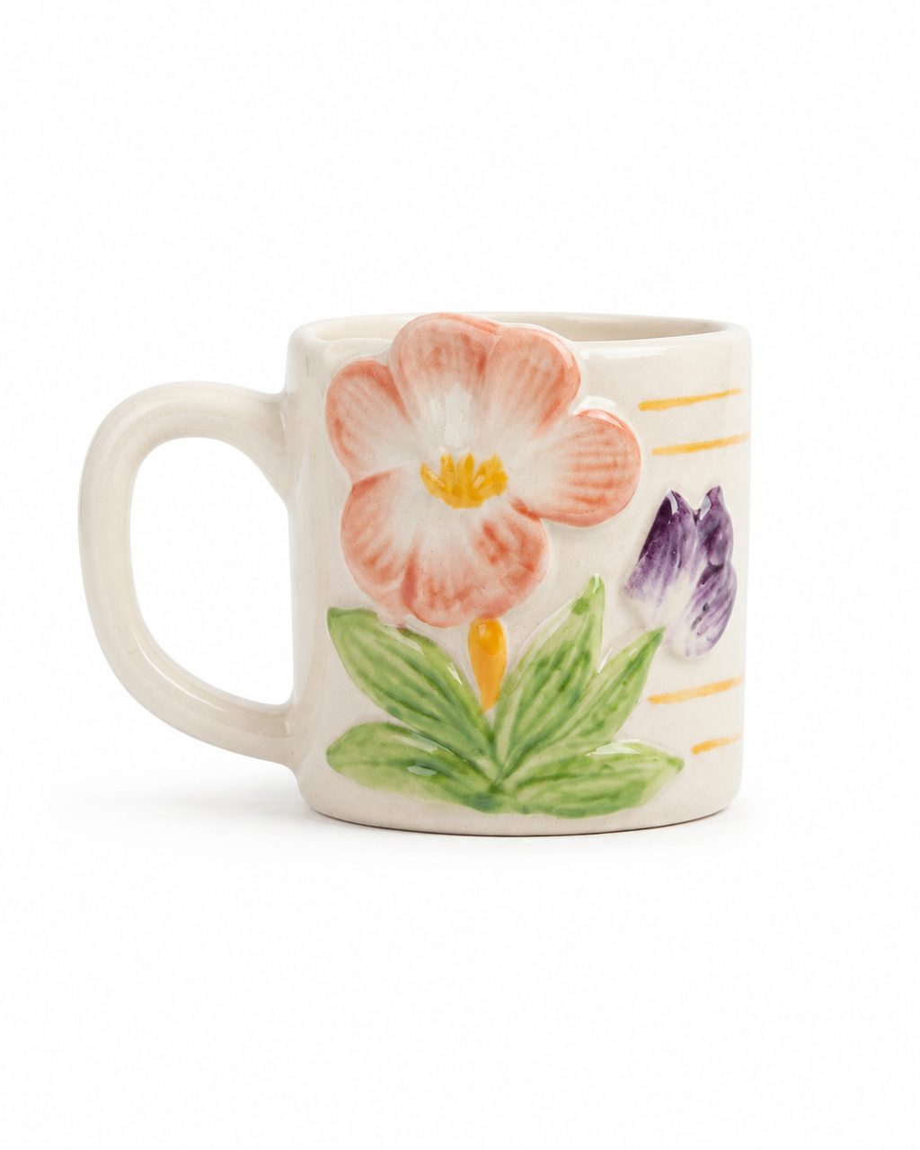 A white ceramic coffee mug decorated with a 3D-effect pink tulip, green leaves, a purple flower, and thin gold stripes on a white background.