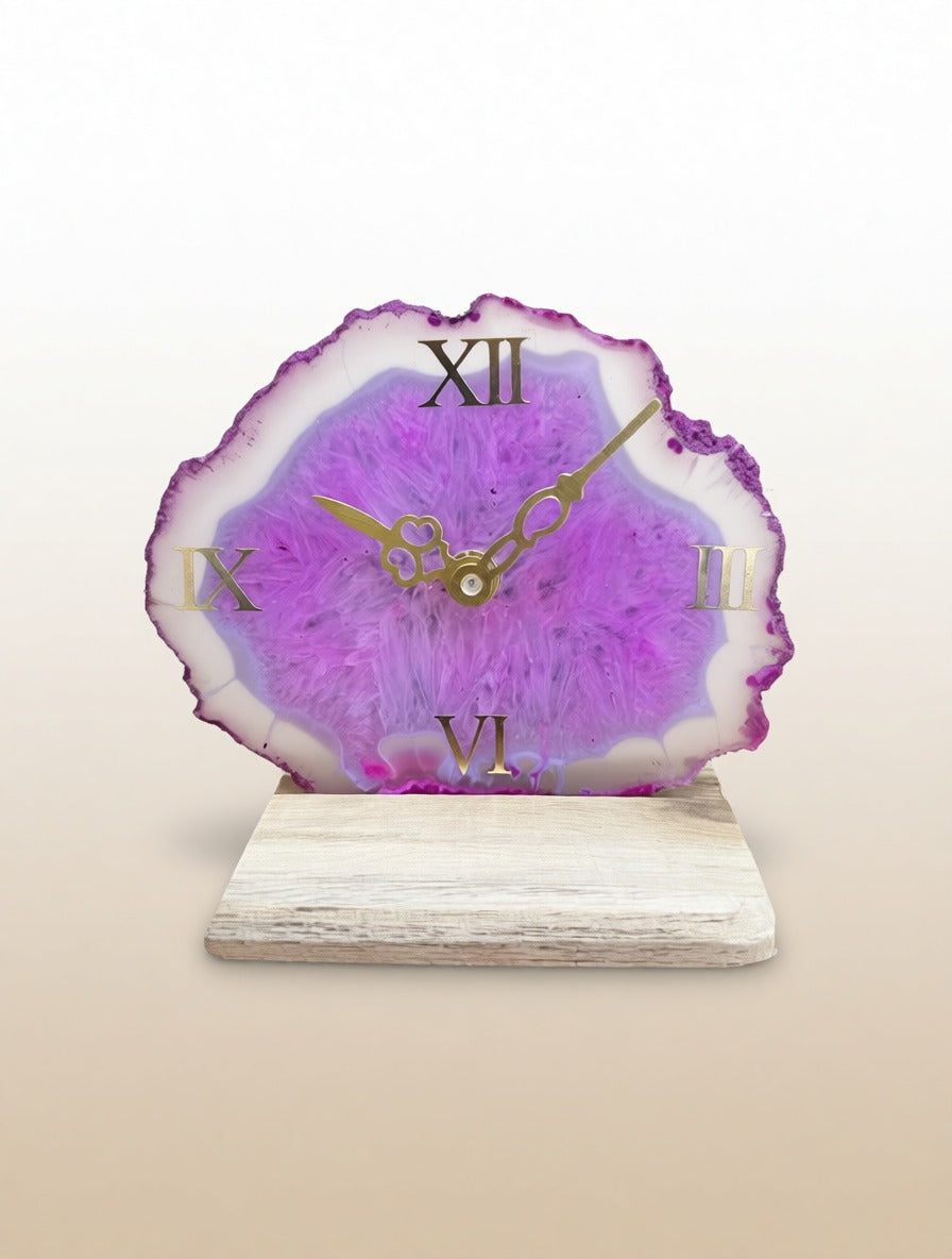 Table clock with a purple agate-like design on a beige background