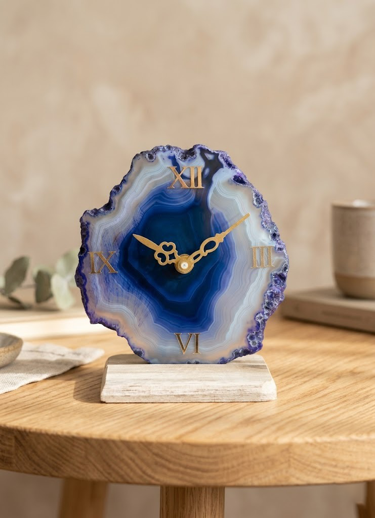 Decorative clock on a wooden table with a blue agate design
