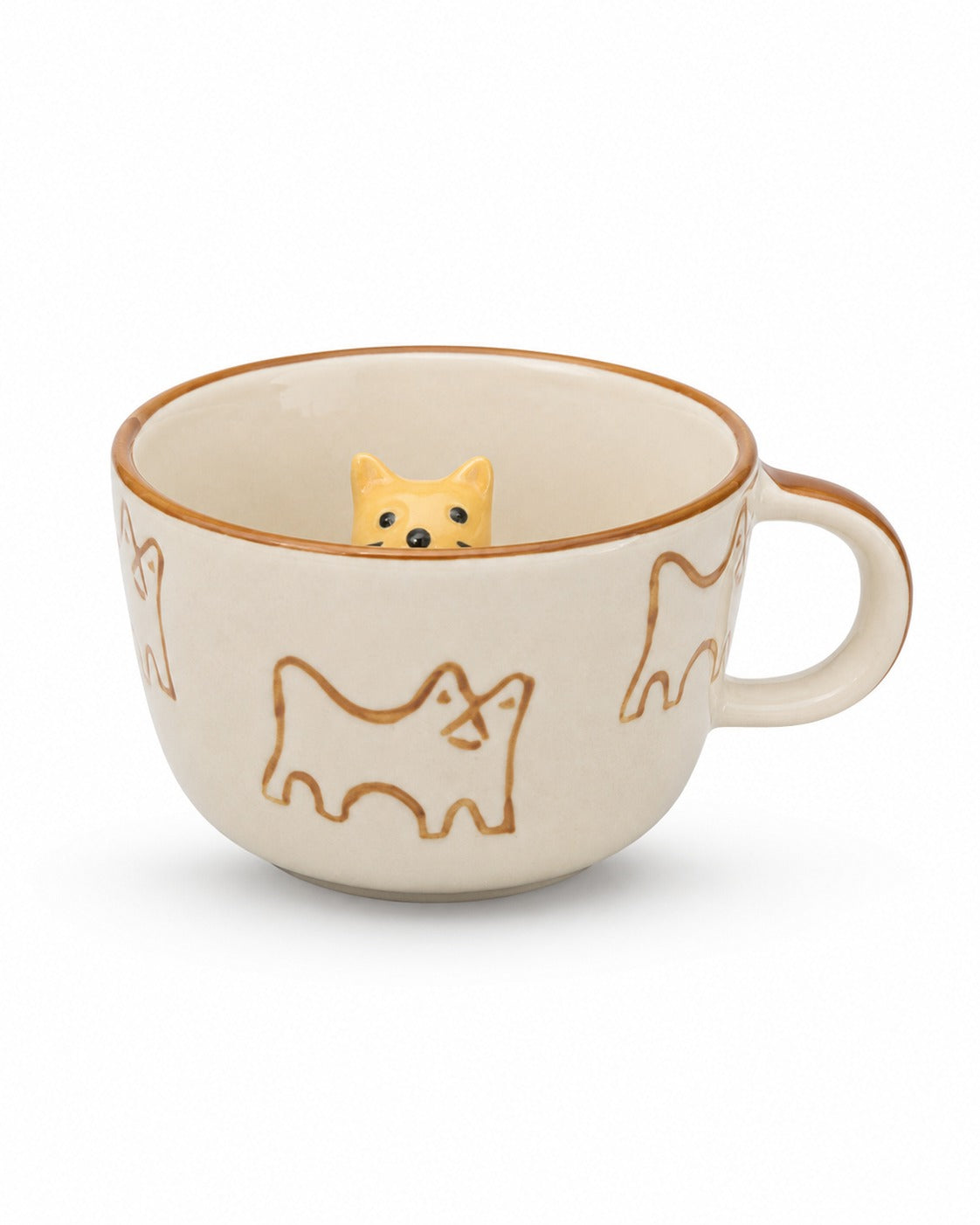An off-white ceramic teacup with brown line-art dog illustrations and a small yellow dog figurine peeking out from inside the cup, set against a plain white background.
