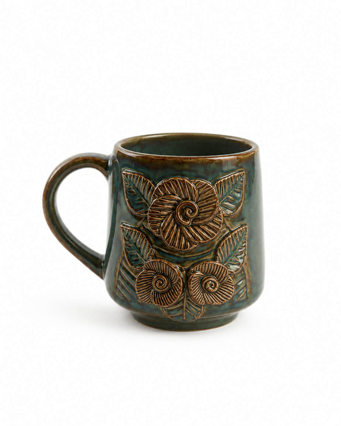 A small ceramic mug with a dark teal-green glaze and raised metallic bronze floral motifs, shown on a plain white background.